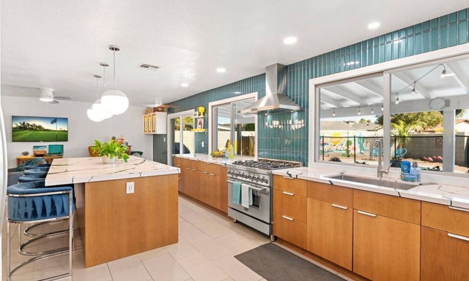 Village Grove House | Vibrant Updated MidCentury Home in OldTown-Htd Pool, Firepit, EV+ Garage, Office