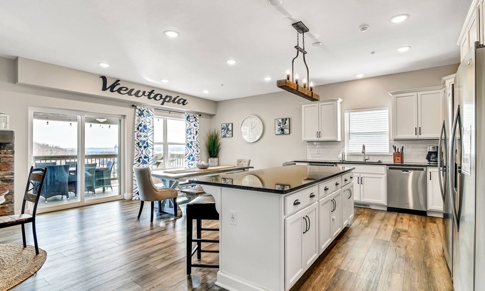 Table Rock Condo | View Topia Vacation Home at Chateau Mountain with Pool and Tub by RedAwning