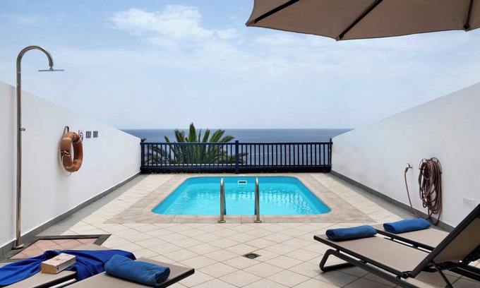 Puerto Calero Villa | Villa 'Ajaches 23' with Sea View, Heated Pool, Balcony, A/C & Wi-Fi