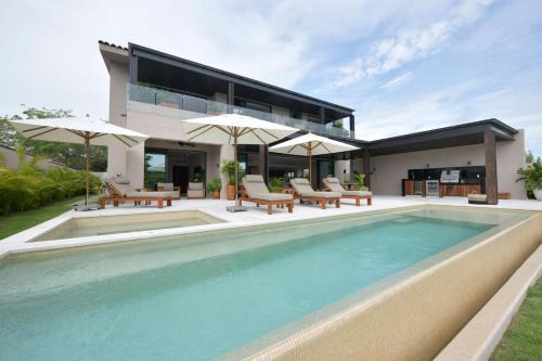 Punta de Mita House | Villa Amada at Porta Fortuna Ocean Views Staff Golf Cart by Mita Residential