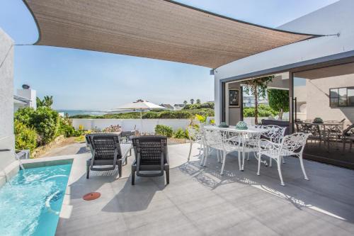 Grotto Bay Villa | Villa Blau -Stunning Beach Front House Grotto Bay Private Nature Reserve West Coast