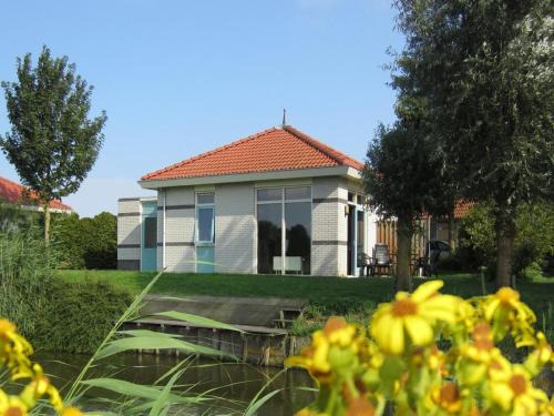 Andijk House | Villa by the Water with Private Jetty