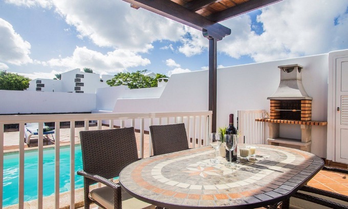 Playa Blanca Villa | Villa Cara: Beautiful modern villa with gated heated pool & air con.