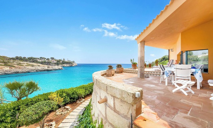 Cala Mandia Villa | Villa Es Mirador with Sea View, Wi-Fi, A/C, Terrace & Garden; Parking Available