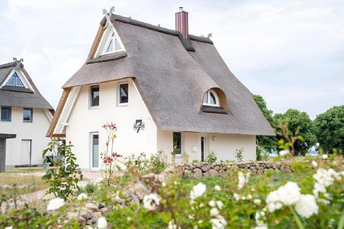 Am Salzhaff House | Villa Haffblick - Ferienhaus mit Kamin, Sauna und Meerblick