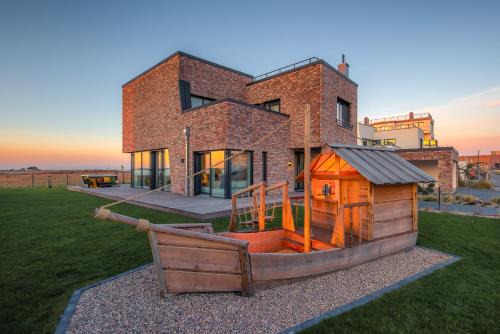 Olpenitz House | Villa King Erste Lage, Dachterrasse, Meerblick, Carport, Kamin, Sauna, Terrasse, Aussenrolllaeden