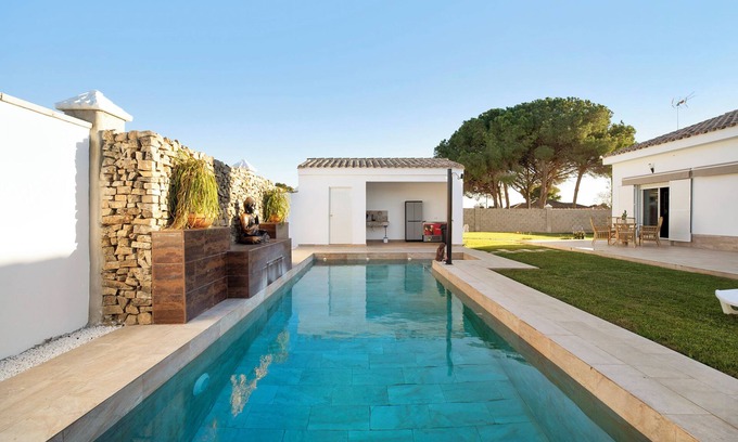 Chiclana de la Frontera Villa | Villa 'Magnolia Chiclana' with Private Pool, Private Terrace and Wi-Fi