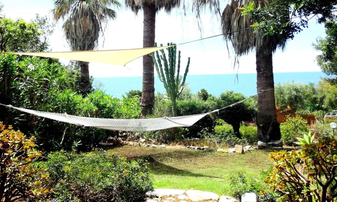 San Stefano Villa | Villa on the sea surrounded by a large garden 100m from the beach of Cala Caterina