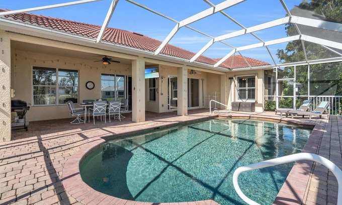 Trafalgar Villa | Villa Pelican - 3 beds/2.5 baths heated pool home in Cape Coral - Palmetto Pine Golf Club