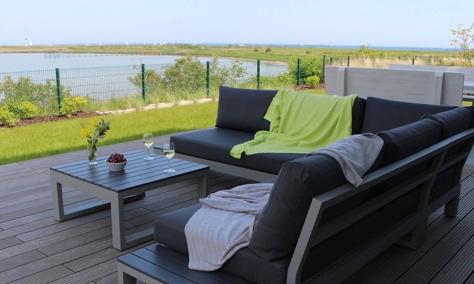 Olpenitzdorf House | Villa Seemööv - 1st row on the water, terrace, balcony, whirlpool, sauna, fireplace