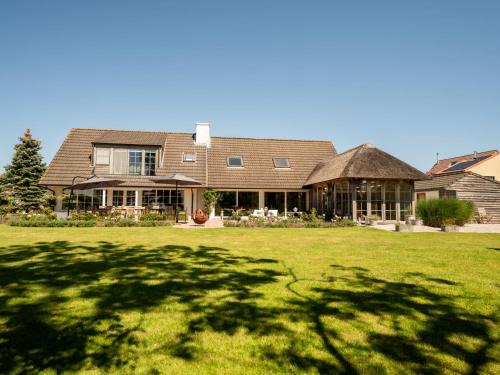 De Haan Villa | Villa Villa Rosetree with sauna and pool table by Interhome