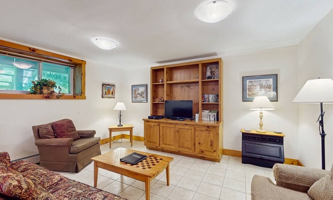 North Troy Condo | Walk to lifts basement condo near water park & golf course with deck