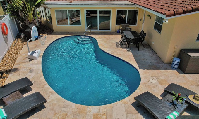 Bel Air House | Walk to the beach! Tiki Hut, Waterfront, Heated Pool, kayaks, bicycles, arcade!