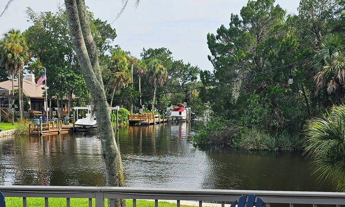 Riverhaven Village House | Waterfont, pool, private boat slip on site, sleeps 8. Plenty of space