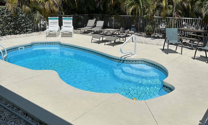 Key Colony Beach House | Waterfront Canal Priv Home. 3BD, 2BA, Pool, Kayak+Cabana Club! 70' Seawall-KCB