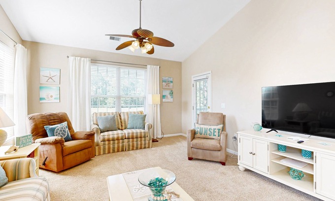 Sunset Beach Condo | Waterfront condo with pool, tennis, bikes & lagoon/golf views - near the beach