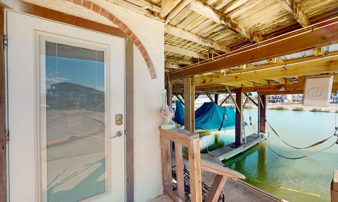 Port Isabel Condo | Waterfront condo with an outdoor pool, washer/dryer, & central AC