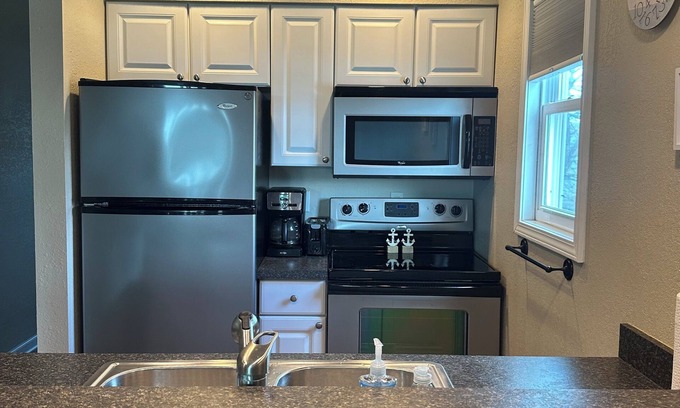 Oak Harbor Condo | Waterfront Cozy 1 Bedroom Condo on the inlet to Lake Erie boat dock steps away.