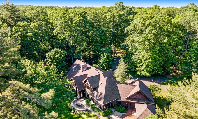Three Lakes House | Waterfront elegance with private beach & hot tub - dogs welcome