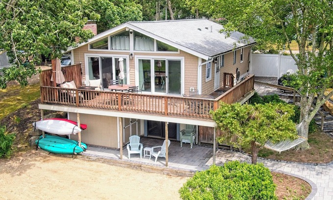 East Falmouth House | Waterfront Getaway w/Private Dock, Deck, Central A/C, & Kayaks