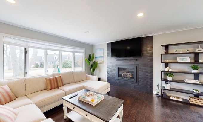 East Falmouth House | Waterfront home with firepit, grill, open layout, smart TVs, deck, W/D, & AC