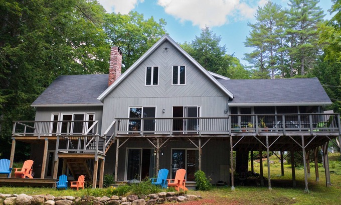 Oxford House | Waterfront Home with ample outdoor entertainment space on Thompson Lake