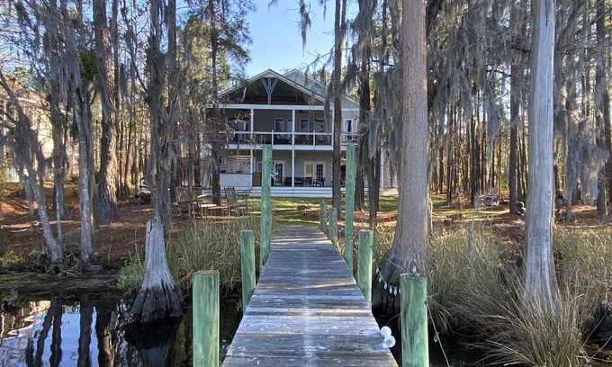 Fairfield Harbour House | Waterfront home with dock and community boat ramp and HUGE screened in porch.