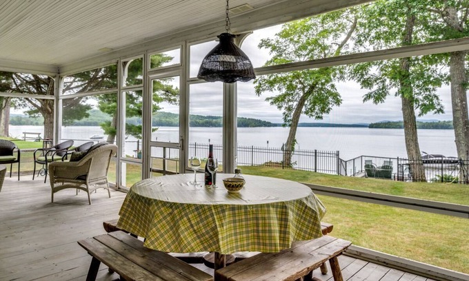 Melvin Village House | Waterfront home with boat dock, screened-in porch, large deck