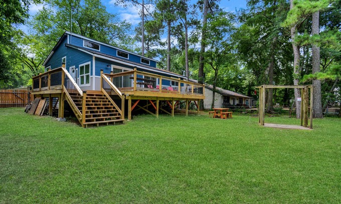 Montgomery House | Waterfront house with a large deck and dock for boat or fishing