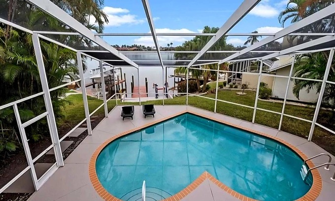 Eight Lakes House | Waterfront-House with Gulf access, heat. pool/spa, boat-dock, great neigborhood