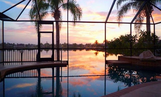 Eight Lakes House | Waterfront, Infinity Pool, BOAT Included in price, Pool Table/Ping Pong, SUPs