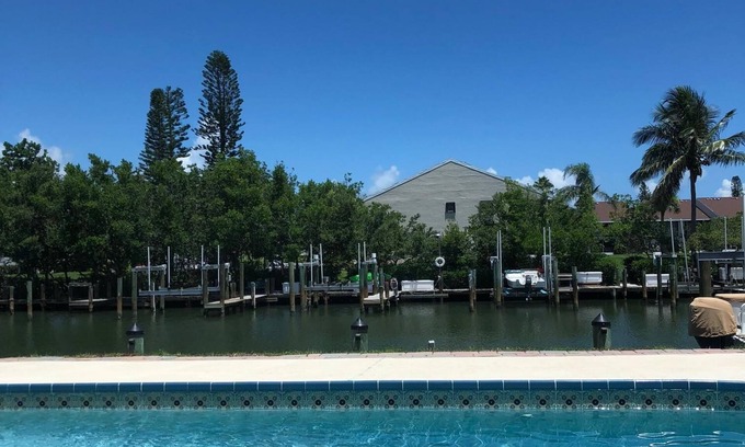 Fort Pierce Shores House | Waterfront Island Home with Dock, Pool and close to the Beach!