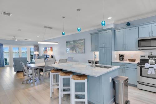 Coral Lagoon House | Waterfront luxury Villa 59 with sunset views and boat slip townhouse