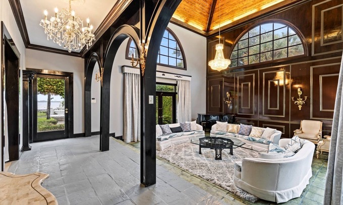 Fort Pierce Villa | Waterfront Mansion w/2 Guest Houses/10' Pool /Private Beach & Boat Dock /Piano