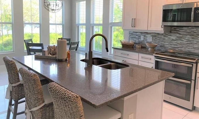 Whitney Beach Villa | Waterfront on Anna Maria Island Sound ~ Beaches, Pool, Country Club Style...