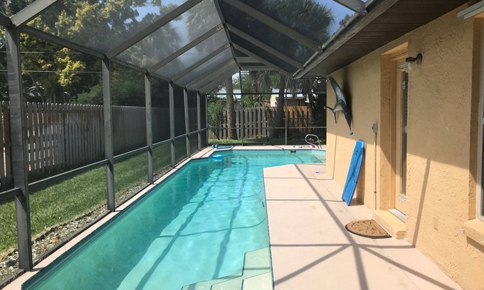 Cocoa Beach House | Waterfront Pool Home w/Private Dock + Fishing, Manatees & Walk to Beach