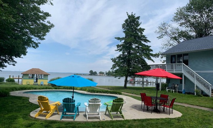 Kent Narrows House | Waterfront property on 3/4 acres with private beach, pool, hot tub, and pier.