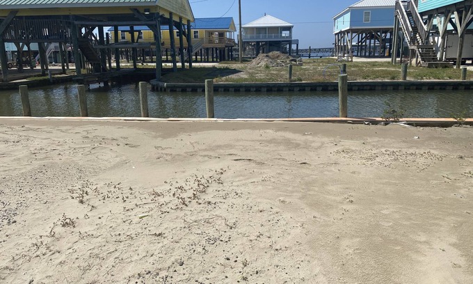 Grand Isle RV Rental | Waterfront RV Lot in upscale neighborhood, water, electric, sewage provided
