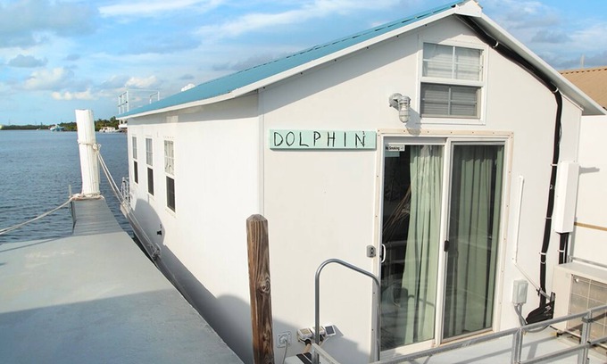 Tavernier Boat Rental | Waterfront Sunset View Aqua Villa Dolphin @ Mangrove Marina Resort