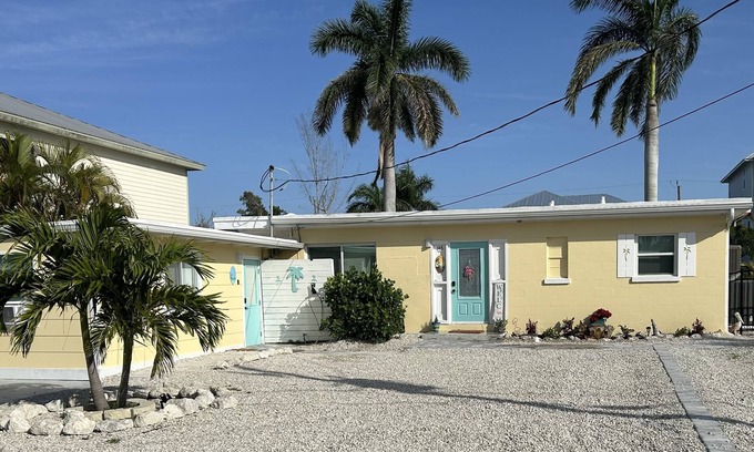 South Island House | WE ARE BACK! NEWER POOL/SPA and Walk to beach! Totally updated Canal front home!