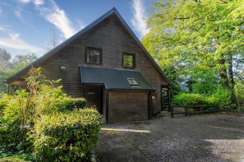 Farley House | Weaver, woodland lodge with hot tub for 12