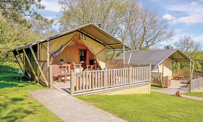 Narberth RV Rental | Well equipped bespoke safari tent with four poster double.