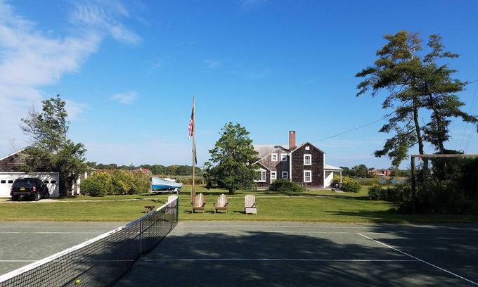 Quioque House | Westhampton quintessential waterfront 2 acres w/tennis, dock.