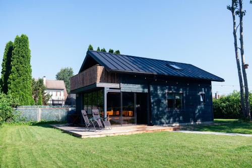 Parnu House | White Nights holiday home with sauna and grill
