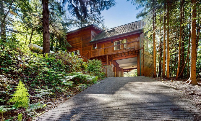 Sudden Valley House | Wilderness retreat on a double lot with a fireplace, large deck, & W/D