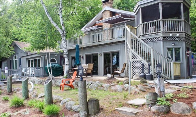 Moultonborough House | Winnipesaukee Waterfront Home sleeping 12 dock and sandy beach