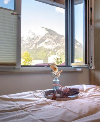Kiefersfelden Apartment | wolke 7, Bergblick Apartment, Kingsizebett & Schlafcouch, Balkon & Garten