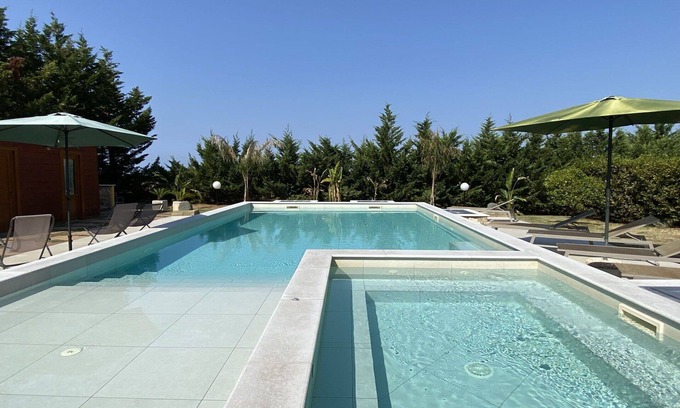 Cecina House | Wonderful private villa with private pool, WIFI, A/C, hot tub, TV, patio, pets allowed and parking
