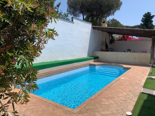 Zona XXX Castel Fusano Apartment | Wonderful Villa Bustini with pool, Roma