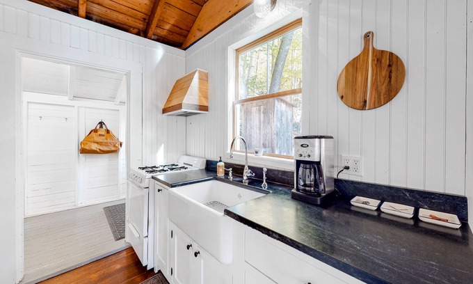 Camden Cottage | Wooded home on the pond with WiFi, wood stove, full Kitchen, loft, bunks, & dock